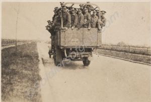 Soldiers packed into a lorry. 1st Battalion, The G
