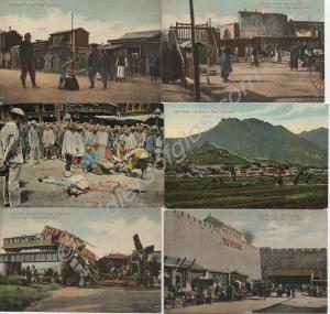 Twenty-seven coloured postcards showing the atroci