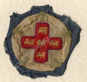 Embroidered badge - white canvas embroidered on bl