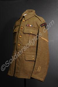 Khaki service jacket. With four blue overseas serv