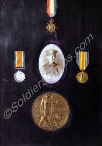 Framed group of three medals; 1914-15 Star, Britis