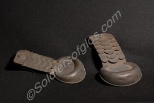 Pair of brass scale epaulettes with blue cloth bac
