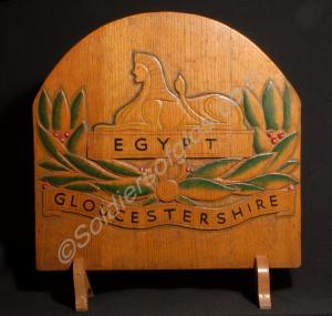 Wood carving of the Gloucestershire Regiment's fro