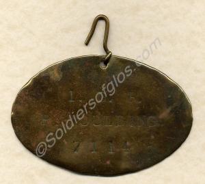 Brass bed label, belonging to 7114 Private Percy M