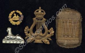 Four badges of the Gloucestershire Regiment; small
