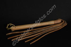 Leather thonged cat o' nine tails with six thongs.