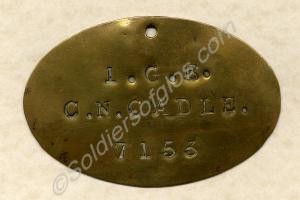 Brass bed label, belonging to 7153 Private Charles
