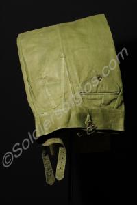 Three pairs of jungle green trousers, as worn by t