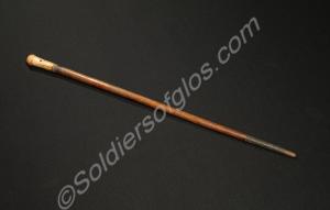 Walking stick with a bone knop and brass tip. 33.5