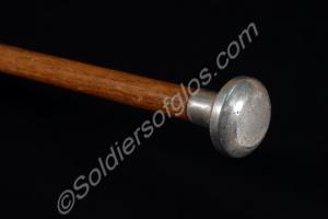 Cane with a silver head. 24 1/4 inches  long.