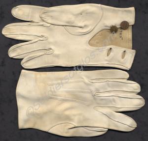 White gloves with brass buttons. Worn by Major E.G