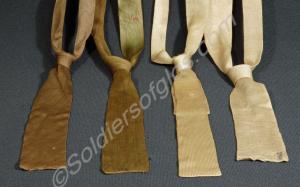 Four Officer's silk ties. Two khaki and two tropic