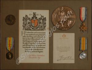 Framed group of three medals and bronze memorial p