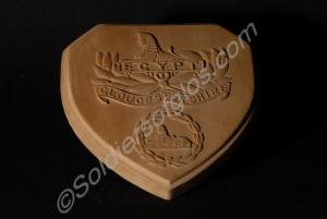 Wooden plaque with Gloucestershire Regiment badges