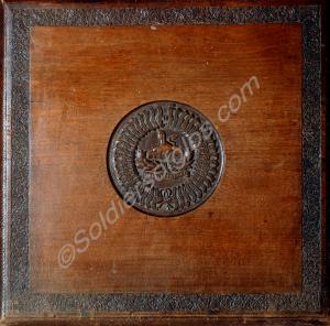 Oak carved table top with front badge and battle h
