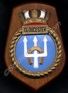 Wooden plaque of the commissioning of H.M.S. Glouc