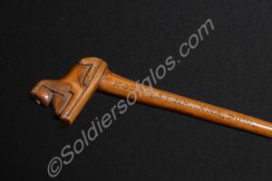 Wooden cane with carved sphinx on top. Made by Boe
