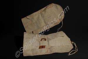 Two white canvas holdalls. The Gloucestershire Reg