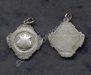 Two silver medals. 144th Infantry Brigade Sports.