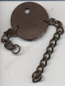 Identity disc belonging  to 1765 Corporal Walter T