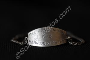 Identification disc and chain. Mrs. J.M. Morton. R
