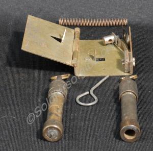 Three booby traps with three firing devices; one f