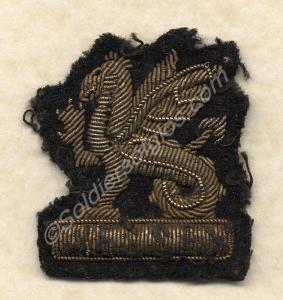 One embroidered Wessex Brigade cap badge. c. 1960.