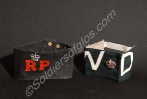 Two arm bands;  Regimental Police in black and red