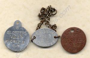 Three identity discs belonging to 1023/267441 Serg