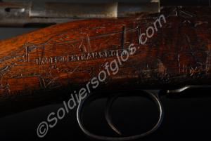 Detail of stock near breech and trigger guard, rig