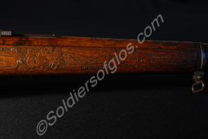 Detail of stock forward of gun sight, right hand s