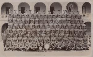 Company group photograph, Private Tuttiet in front
