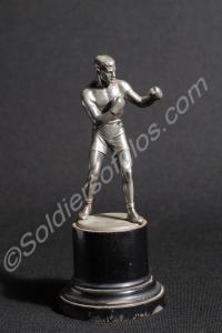 Boxing trophy in pewter on black plinth. Catterick