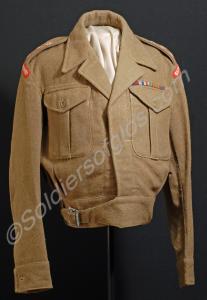 Battle dress blouse with ribbon bars. Worn by Capt