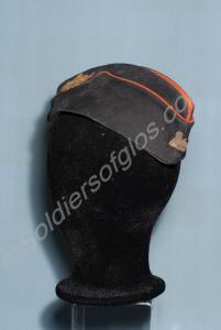 Officers blue side cap with embroidered badges. Th