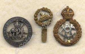 Three badges; one brass Back Badge, one Silver War