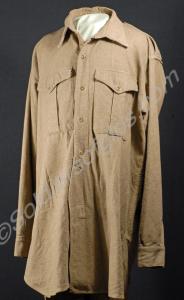 Two khaki flannel shirts. Worn by Maj. P.W. Weller