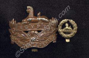 Two badges; white metal Gloucestershire Regiment f
