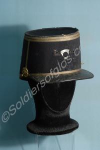 Shako or kepi,  much furniture missing. Gloucester