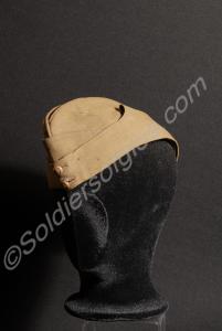Khaki side cap with missing badges and buttons. Pr