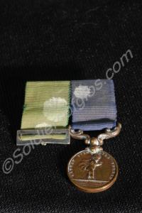 Group of two miniature  medals; Turkish Medal (rib
