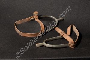 Pair of spurs with straps, engraved with small sta