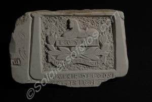 Front badge of the Gloucestershire Regiment carved