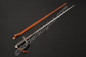 Sword and brown leather scabbard with brown leathe