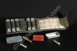 Green canvas first aid wallet with six aluminium c