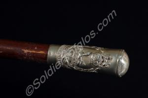 Brown wood regimental cane with silver knob and ti