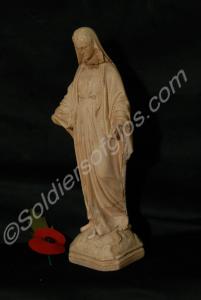 White cast statuette of the Madonna found in piece