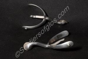 One pair of chrome spurs, made by Craig and Davies