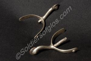 One pair of chrome spurs, with one prong cut off.
