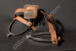One pair of chrome spurs, with brown leather strap